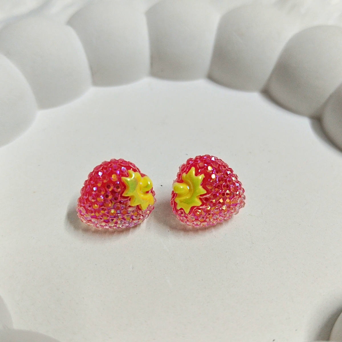 Red glitter strawberry earrings with yellow top in resin