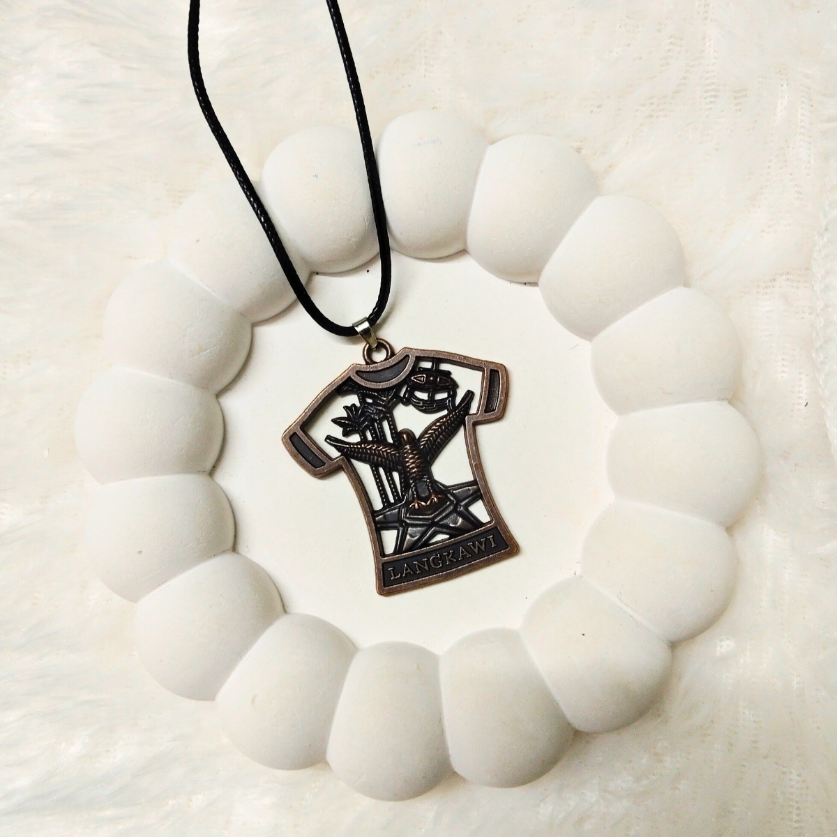 Bold eagle flying design on Langkawi T-shirt shaped pendant chain with black cord – men’s fashion necklace