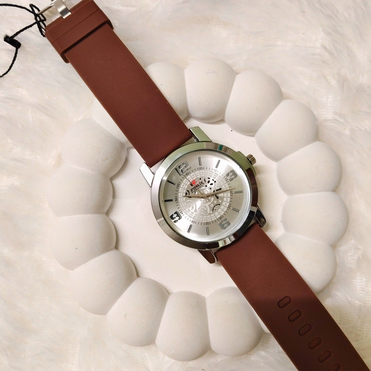 Men's analog wrist watch with brown strap, silver bezel, and unique skeleton-style white dial – Forlix brand.