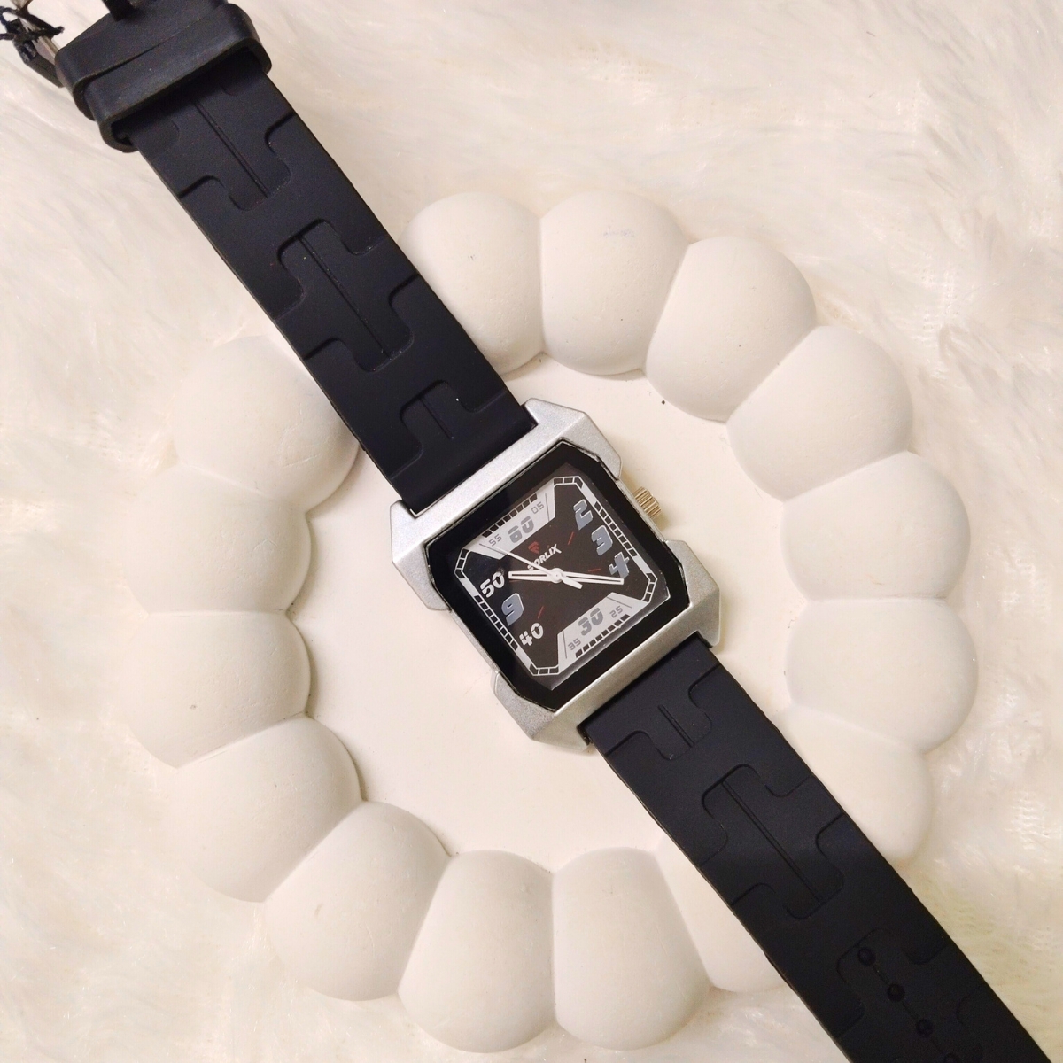 Modern unisex digital analog watch with black strap and sporty rectangular dial