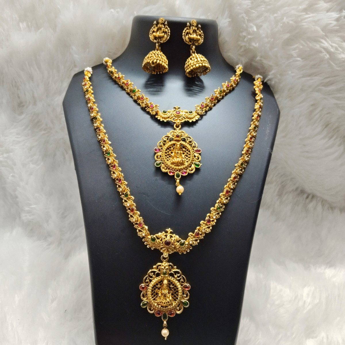 Lakshmi Temple Jewellery Set with Short Necklace, Long Haram and Jhumka Earrings in Antique Gold
